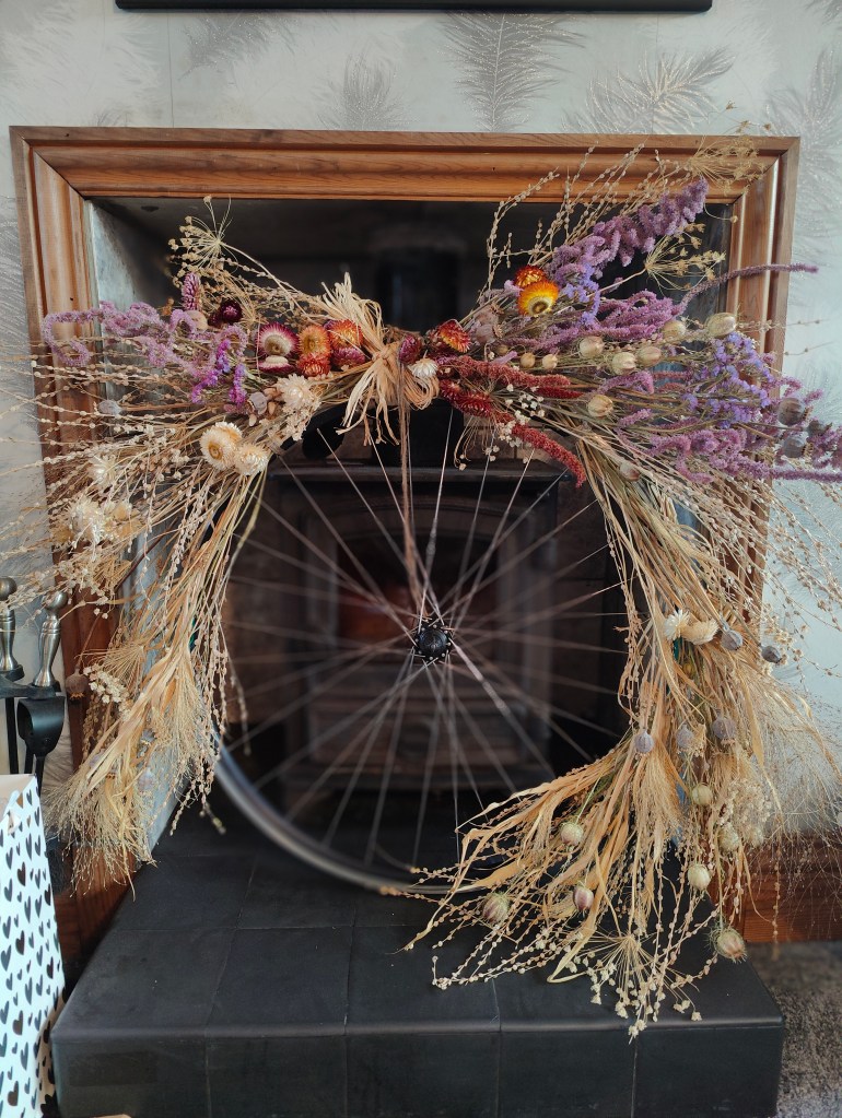 Beautiful wheel decorated with dried flowers
